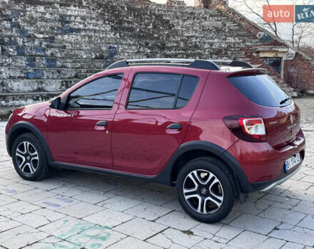 Красный Рено Сандеро, объемом двигателя 1.6 л и пробегом 88 тыс. км за 8799 $, фото 4 на Automoto.ua