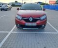 Красный Рено Сандеро, объемом двигателя 1.46 л и пробегом 100 тыс. км за 7800 $, фото 1 на Automoto.ua