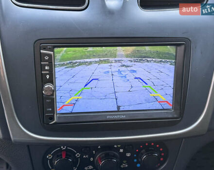 Красный Рено Сандеро, объемом двигателя 1.6 л и пробегом 88 тыс. км за 8799 $, фото 21 на Automoto.ua