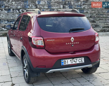 Красный Рено Сандеро, объемом двигателя 1.6 л и пробегом 88 тыс. км за 8799 $, фото 6 на Automoto.ua