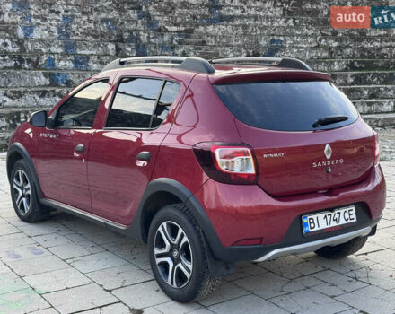 Красный Рено Сандеро, объемом двигателя 1.6 л и пробегом 88 тыс. км за 8799 $, фото 5 на Automoto.ua