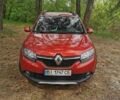 Красный Рено Сандеро, объемом двигателя 1.6 л и пробегом 88 тыс. км за 9500 $, фото 6 на Automoto.ua
