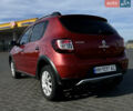 Красный Рено Сандеро, объемом двигателя 1.6 л и пробегом 87 тыс. км за 9900 $, фото 4 на Automoto.ua