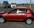 Красный Рено Сандеро, объемом двигателя 1.6 л и пробегом 84 тыс. км за 10900 $, фото 4 на Automoto.ua