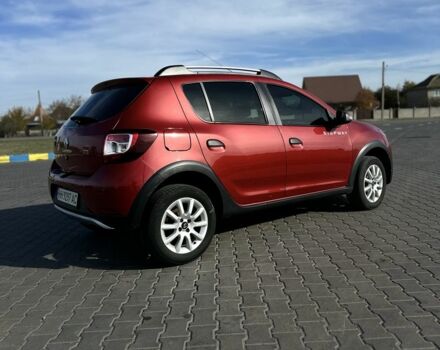 Красный Рено Сандеро, объемом двигателя 1.6 л и пробегом 84 тыс. км за 10900 $, фото 3 на Automoto.ua