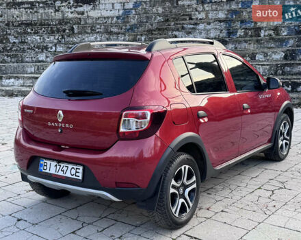 Красный Рено Сандеро, объемом двигателя 1.6 л и пробегом 88 тыс. км за 8799 $, фото 9 на Automoto.ua