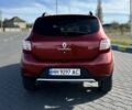 Красный Рено Сандеро, объемом двигателя 1.6 л и пробегом 84 тыс. км за 10900 $, фото 6 на Automoto.ua