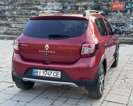 Красный Рено Сандеро, объемом двигателя 1.6 л и пробегом 88 тыс. км за 8799 $, фото 7 на Automoto.ua