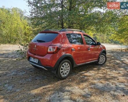 Рено Сандеро 2015 в Полтаве на Automoto.ua Красный Рено Сандеро, объемом двигателя 1.6 л и пробегом 88 тыс. км за 8500 $, фото 20 на Automoto.ua