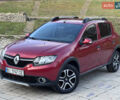 Красный Рено Сандеро, объемом двигателя 1.6 л и пробегом 88 тыс. км за 8799 $, фото 1 на Automoto.ua