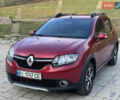 Красный Рено Сандеро, объемом двигателя 1.6 л и пробегом 88 тыс. км за 8799 $, фото 1 на Automoto.ua