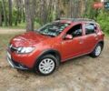 Рено Сандеро 2015 в Полтаве на Automoto.ua Красный Рено Сандеро, объемом двигателя 1.6 л и пробегом 88 тыс. км за 8500 $, фото 21 на Automoto.ua