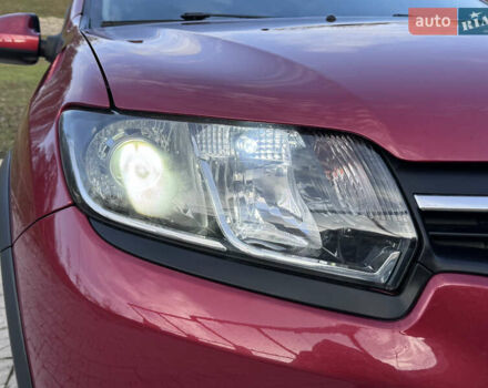 Красный Рено Сандеро, объемом двигателя 1.6 л и пробегом 88 тыс. км за 8799 $, фото 30 на Automoto.ua