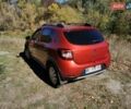 Рено Сандеро 2015 в Полтаве на Automoto.ua Красный Рено Сандеро, объемом двигателя 1.6 л и пробегом 88 тыс. км за 8500 $, фото 13 на Automoto.ua