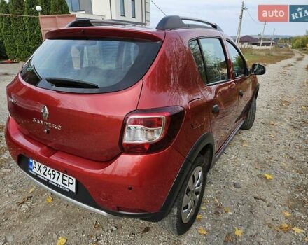 Красный Рено Сандеро, объемом двигателя 0.9 л и пробегом 92 тыс. км за 9000 $, фото 3 на Automoto.ua