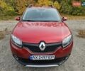 Красный Рено Сандеро, объемом двигателя 0.9 л и пробегом 92 тыс. км за 9000 $, фото 6 на Automoto.ua
