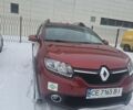 Красный Рено Сандеро, объемом двигателя 0.9 л и пробегом 74 тыс. км за 9600 $, фото 1 на Automoto.ua
