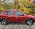 Червоний Рено Сандеро, об'ємом двигуна 0.9 л та пробігом 92 тис. км за 7200 $, фото 1 на Automoto.ua