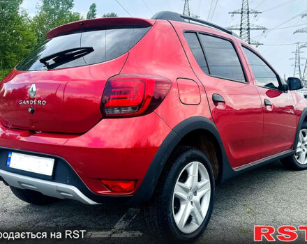Красный Рено Сандеро, объемом двигателя 1.5 л и пробегом 125 тыс. км за 7900 $, фото 5 на Automoto.ua