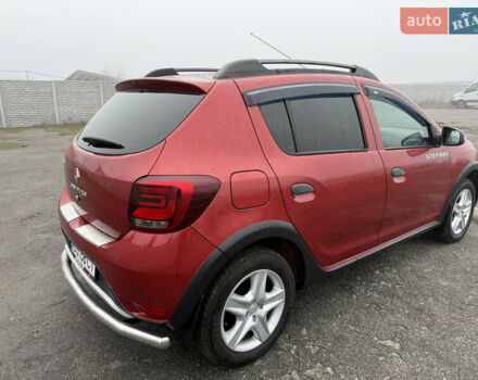 Красный Рено Сандеро, объемом двигателя 1.5 л и пробегом 94 тыс. км за 10700 $, фото 5 на Automoto.ua