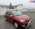 Красный Рено Сандеро, объемом двигателя 1.5 л и пробегом 94 тыс. км за 10700 $, фото 1 на Automoto.ua