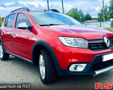 Красный Рено Сандеро, объемом двигателя 1.5 л и пробегом 125 тыс. км за 7900 $, фото 1 на Automoto.ua