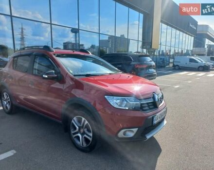 Красный Рено Сандеро, объемом двигателя 0.9 л и пробегом 90 тыс. км за 12000 $, фото 1 на Automoto.ua