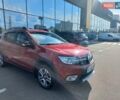 Красный Рено Сандеро, объемом двигателя 0.9 л и пробегом 90 тыс. км за 12000 $, фото 1 на Automoto.ua