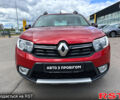 Красный Рено Сандеро, объемом двигателя 1.5 л и пробегом 159 тыс. км за 10950 $, фото 1 на Automoto.ua