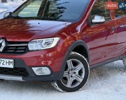 Красный Рено Сандеро, объемом двигателя 1.46 л и пробегом 55 тыс. км за 12250 $, фото 1 на Automoto.ua