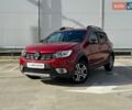 Красный Рено Сандеро, объемом двигателя 0.9 л и пробегом 91 тыс. км за 11990 $, фото 3 на Automoto.ua