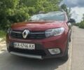 Красный Рено Сандеро, объемом двигателя 0.9 л и пробегом 125 тыс. км за 9300 $, фото 29 на Automoto.ua