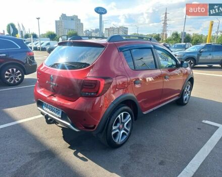 Красный Рено Сандеро, объемом двигателя 0.9 л и пробегом 90 тыс. км за 12000 $, фото 4 на Automoto.ua