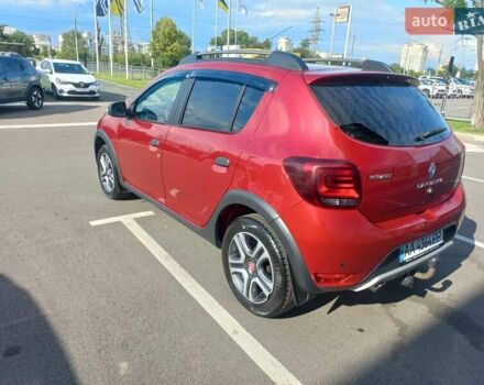 Красный Рено Сандеро, объемом двигателя 0.9 л и пробегом 90 тыс. км за 12000 $, фото 3 на Automoto.ua