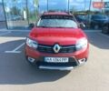 Красный Рено Сандеро, объемом двигателя 0.9 л и пробегом 90 тыс. км за 12000 $, фото 1 на Automoto.ua