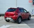 Красный Рено Сандеро, объемом двигателя 0.9 л и пробегом 91 тыс. км за 11990 $, фото 7 на Automoto.ua