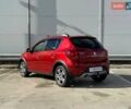 Красный Рено Сандеро, объемом двигателя 0.9 л и пробегом 91 тыс. км за 11990 $, фото 4 на Automoto.ua