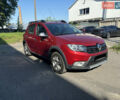 Красный Рено Сандеро, объемом двигателя 0.9 л и пробегом 72 тыс. км за 11000 $, фото 1 на Automoto.ua