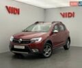 Красный Рено Сандеро, объемом двигателя 1.5 л и пробегом 124 тыс. км за 9531 $, фото 1 на Automoto.ua