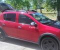 Красный Рено Сандеро, объемом двигателя 1.46 л и пробегом 106 тыс. км за 10000 $, фото 1 на Automoto.ua
