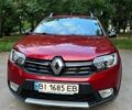 Красный Рено Сандеро, объемом двигателя 0.9 л и пробегом 28 тыс. км за 11000 $, фото 1 на Automoto.ua