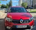 Красный Рено Сандеро, объемом двигателя 0.9 л и пробегом 98 тыс. км за 9400 $, фото 1 на Automoto.ua