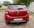 Красный Рено Сандеро, объемом двигателя 1.5 л и пробегом 122 тыс. км за 7800 $, фото 4 на Automoto.ua