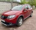 Красный Рено Сандеро, объемом двигателя 1.5 л и пробегом 122 тыс. км за 7800 $, фото 1 на Automoto.ua