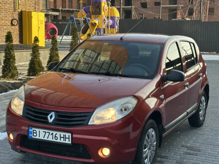 Красный Рено Сандеро, объемом двигателя 1.6 л и пробегом 220 тыс. км за 5300 $, фото 1 на Automoto.ua