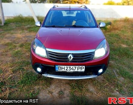 Красный Рено Сандеро, объемом двигателя 1.6 л и пробегом 250 тыс. км за 4800 $, фото 1 на Automoto.ua