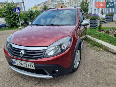 Рено Сандеро 2011 в Черкассах на Automoto.ua Красный Рено Сандеро, объемом двигателя 1.6 л и пробегом 154 тыс. км за 6700 $, фото 1 на Automoto.ua