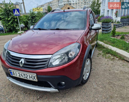 Красный Рено Сандеро, объемом двигателя 1.6 л и пробегом 154 тыс. км за 6700 $, фото 1 на Automoto.ua