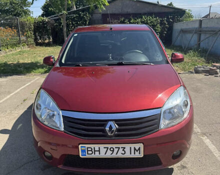 Красный Рено Сандеро, объемом двигателя 1.6 л и пробегом 66 тыс. км за 7000 $, фото 1 на Automoto.ua