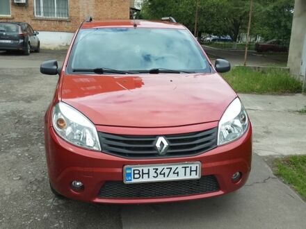 Рено Сандеро 2011 в Подольск (Котовск) на Automoto.ua Красный Рено Сандеро, объемом двигателя 1.4 л и пробегом 93 тыс. км за 5300 $, фото 1 на Automoto.ua